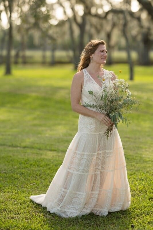Bride with bouquet in nature