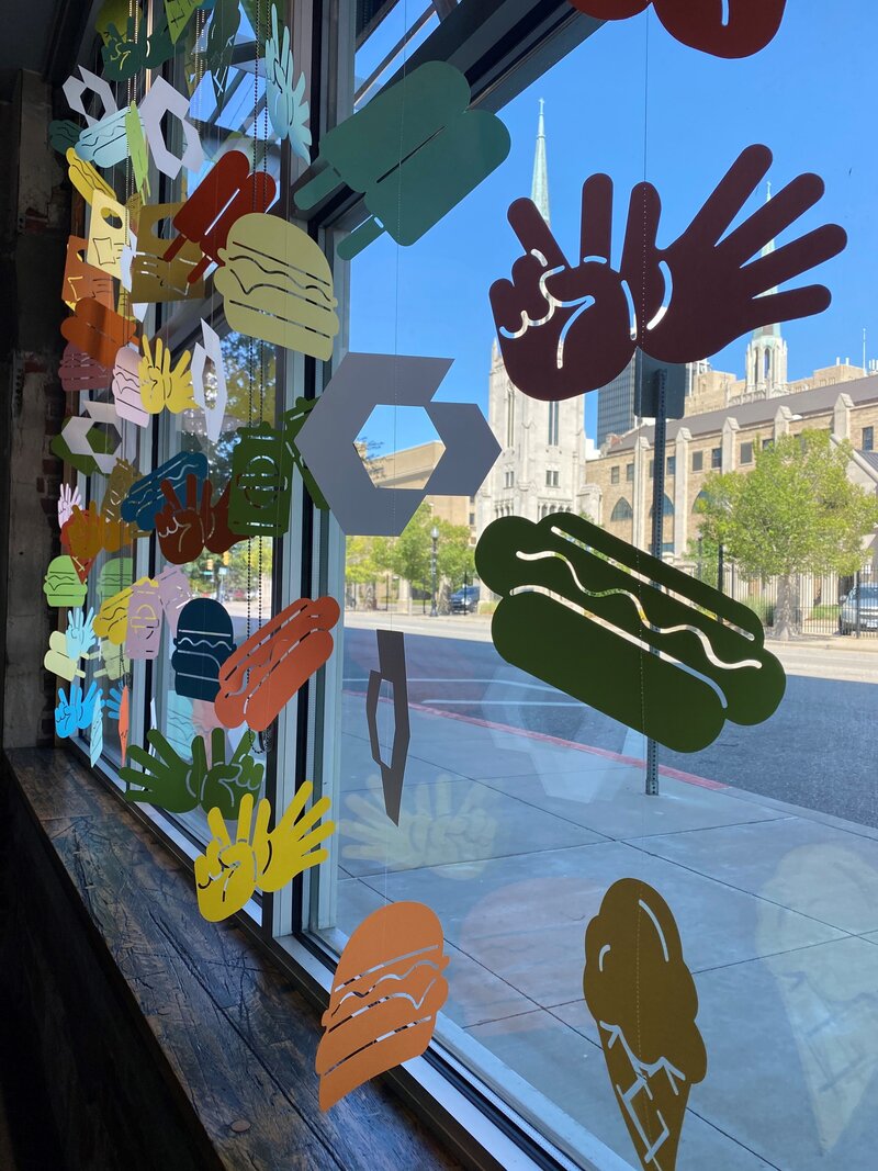 common_cheers_window_installation_paper_garlands