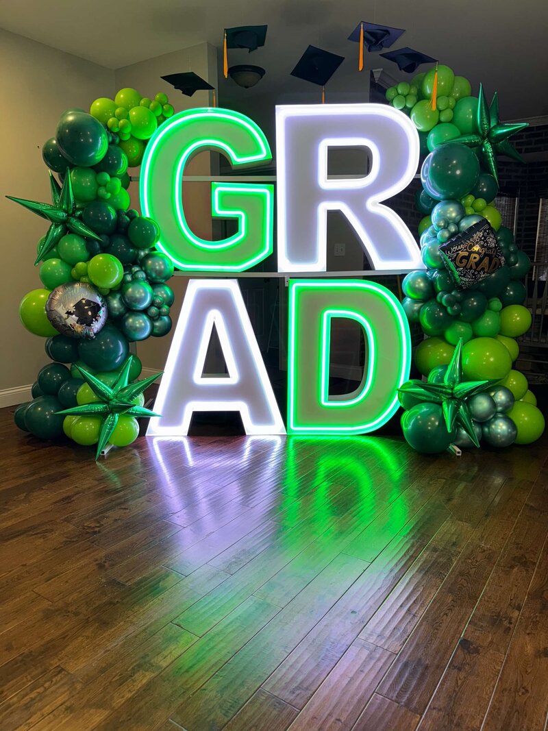 big LED light up letters and balloons for graduation party in St. Louis by Dreamsc8pes