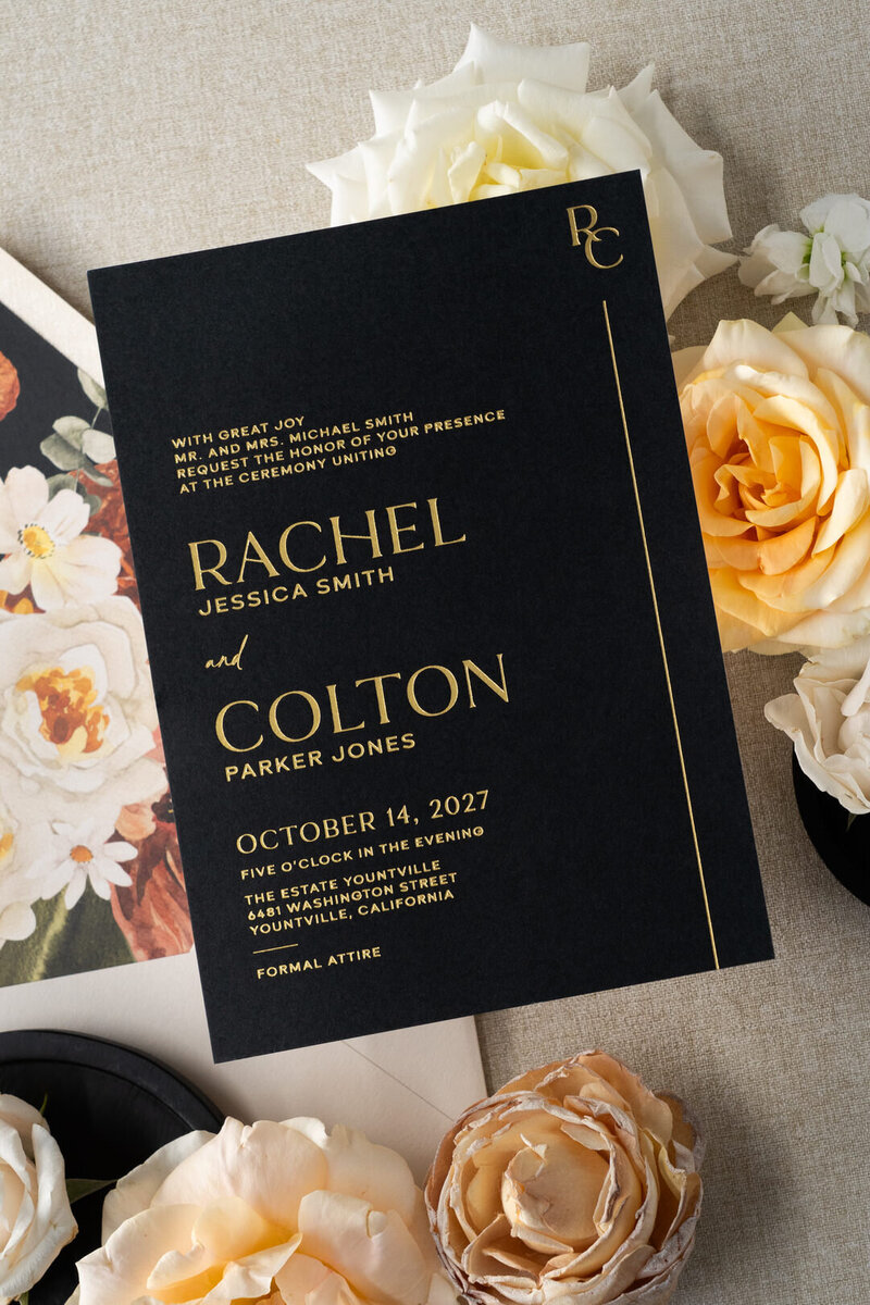 Bride and groom holding vow books