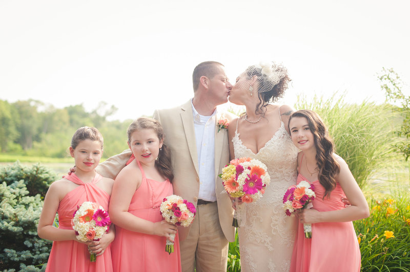 intimate wedding joining two families at the mill in spring lake