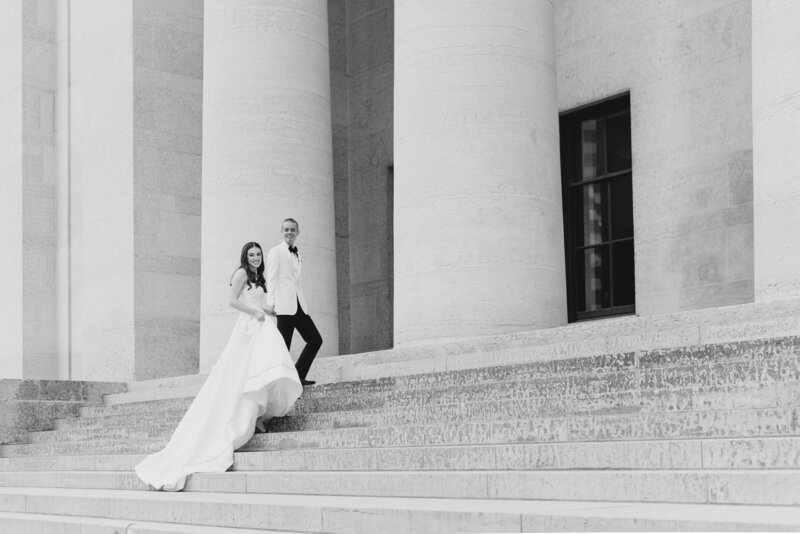 Bride and Groom walking up steps at Ohio State House in Columbus, Ohio