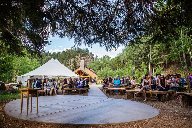 Wedding ceremony under the trees at Blackstone Rivers Ranch