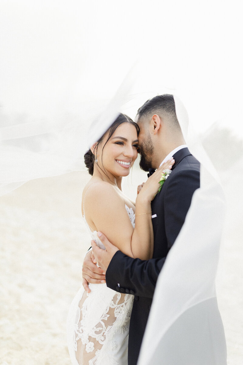 bride and groom embrace