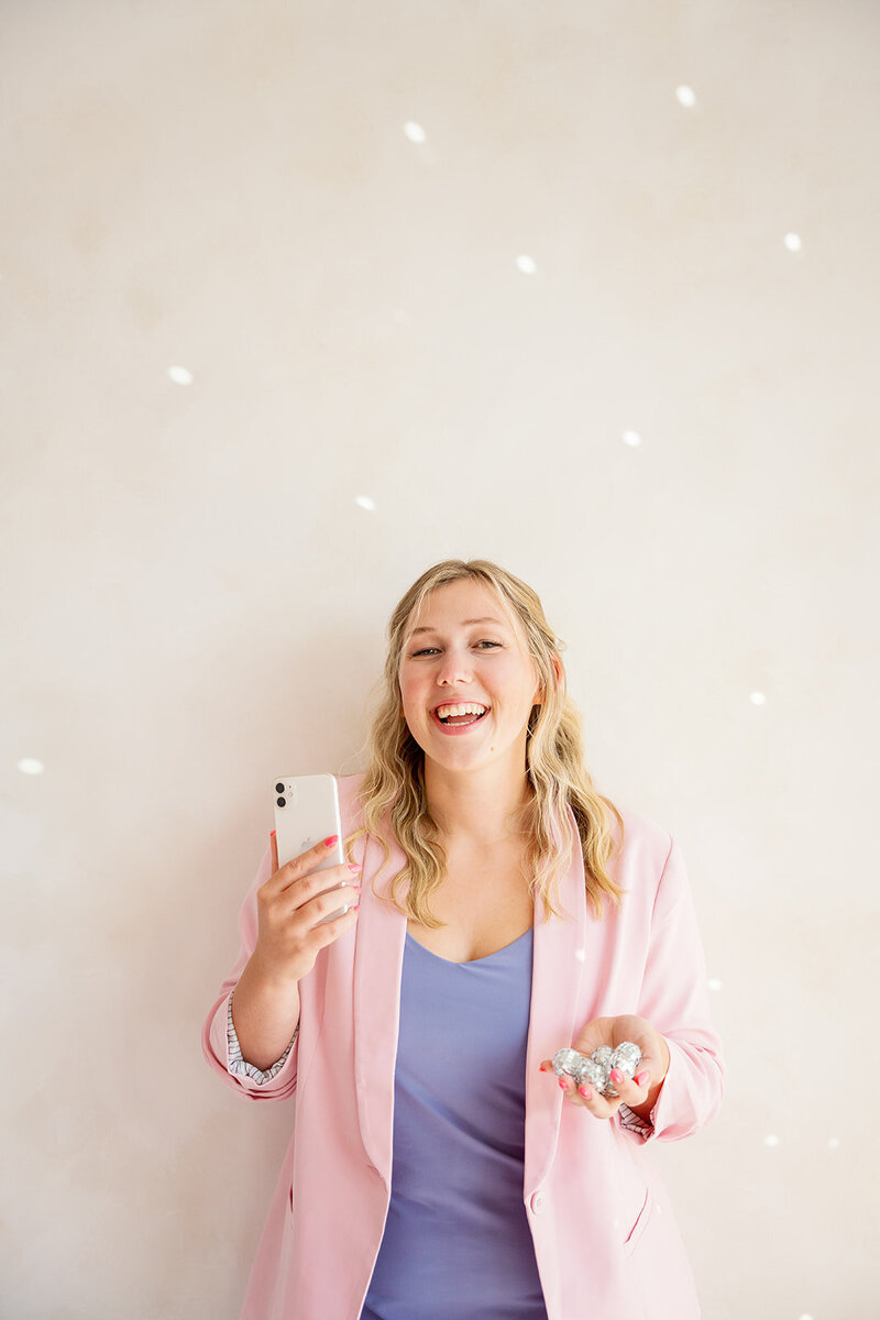 Kat Murphy holding her iPhone