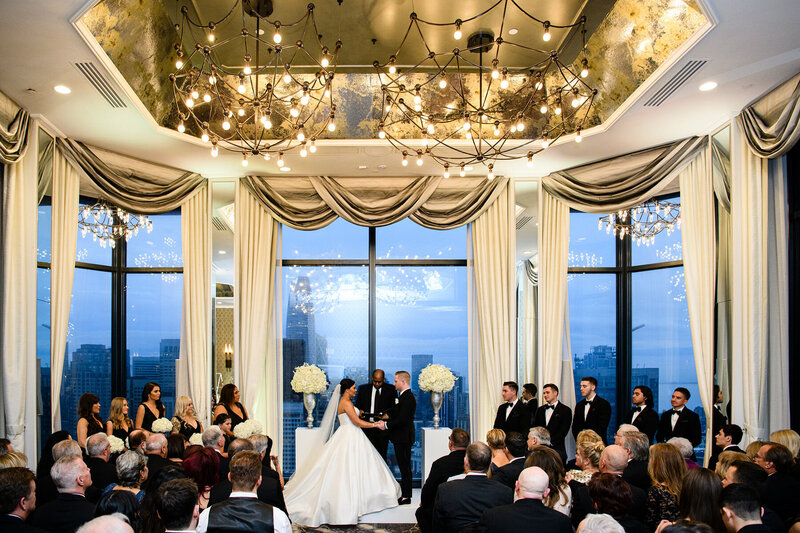 Westin St. Francis ceremony with San Francisco skyline views and crystal chandeliers - wedding photographer
