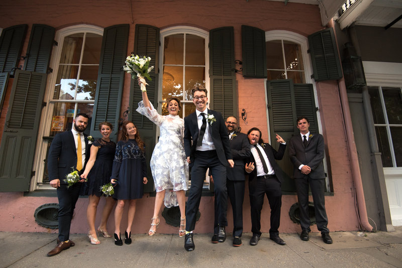 Couple jumps during their intimate wedding in New Orleans