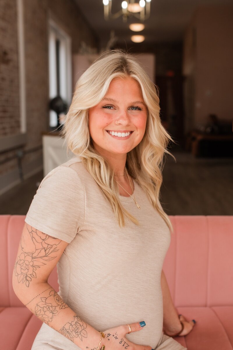 Blonde hairstylist at The Vanity Hair Studio, Griffin, GA, specializing in highlights, balayage, and creating vibrant, healthy hair for clients.