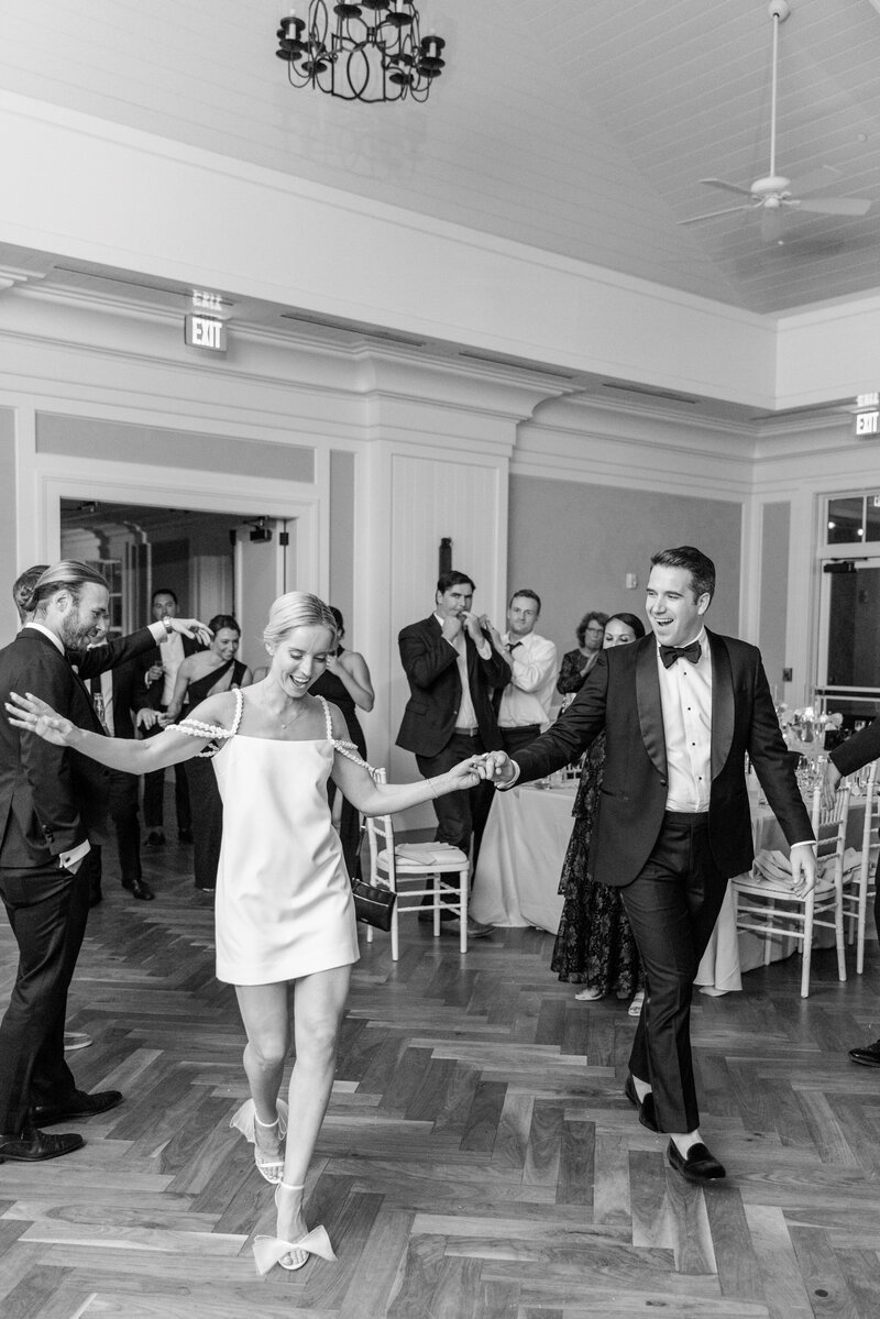 Bride and groom dancing shot during wedding in Charleston, SC by Charleston wedding photographer Dana Cubbage.