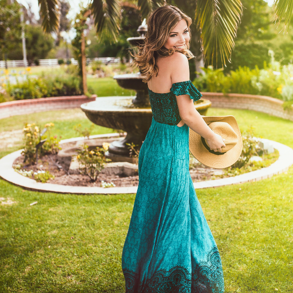 girl in turquoise jumpsuit senior portrait photogaphy