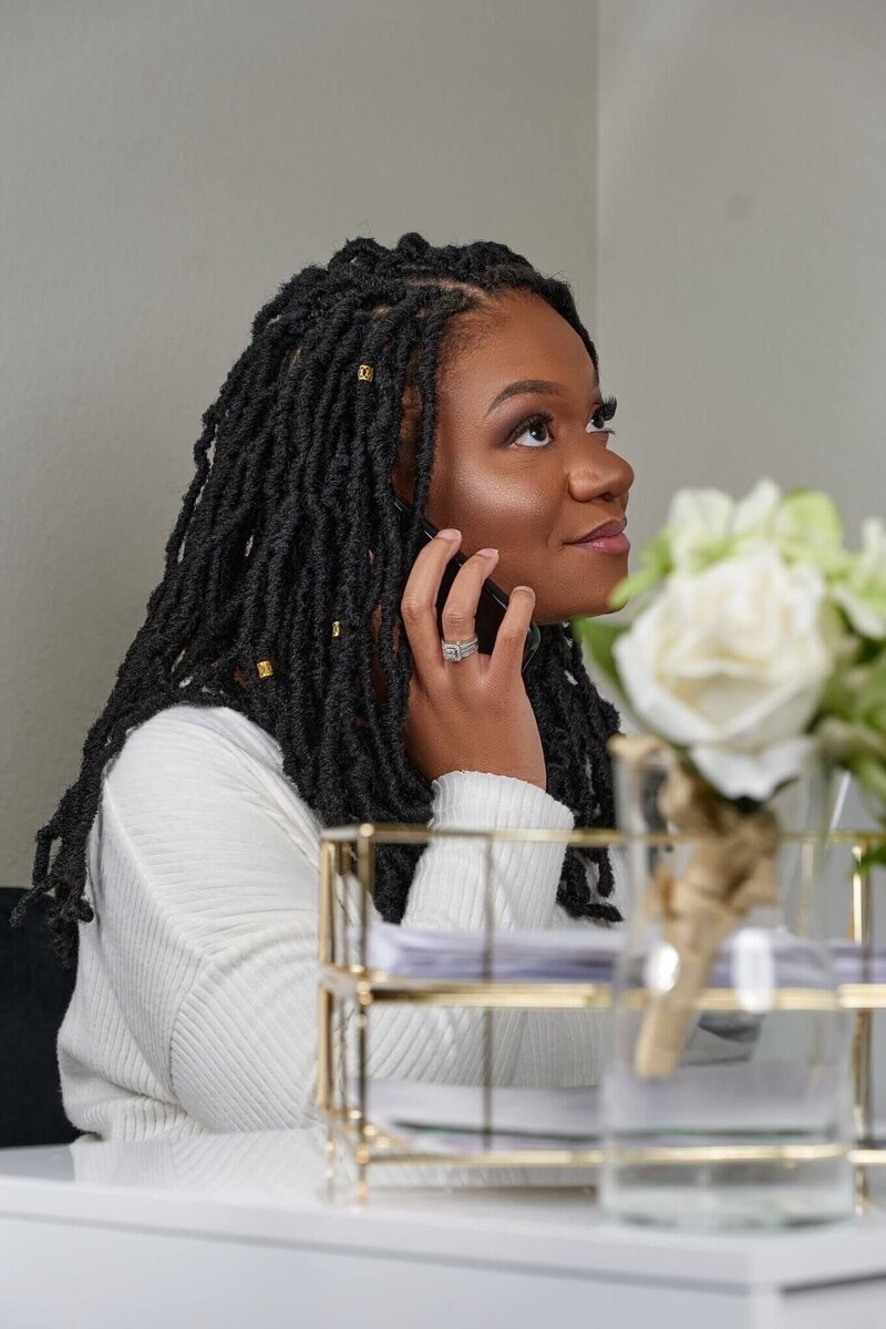 Beckie Rose, founder of NorthRose Studio smiling on video call