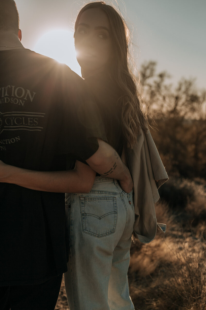 engagement session outfit with levis and black t shirt at lost dutchman state park