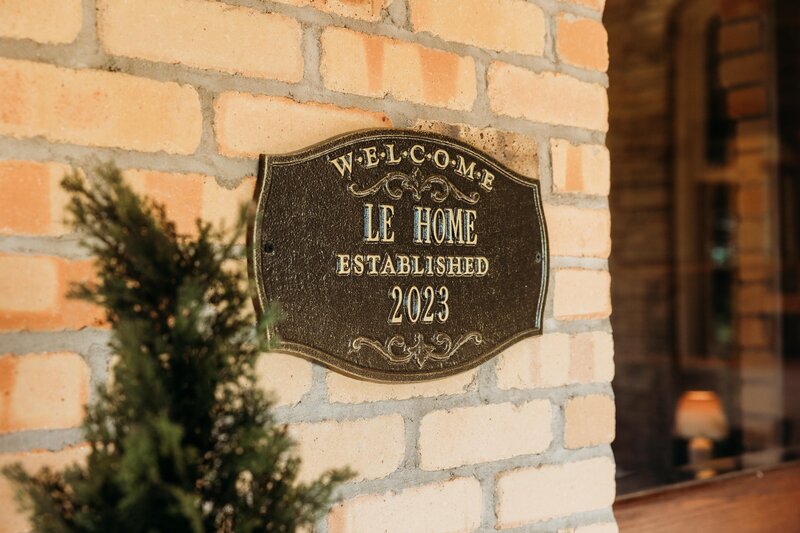 Front entry sign at Le Home Stay in Ionia.