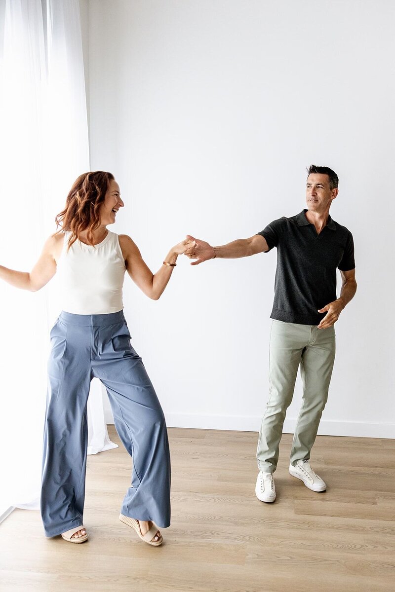 Chris & Sara Warden from Embody Health & Performance demonstrating whole body health by dancing
