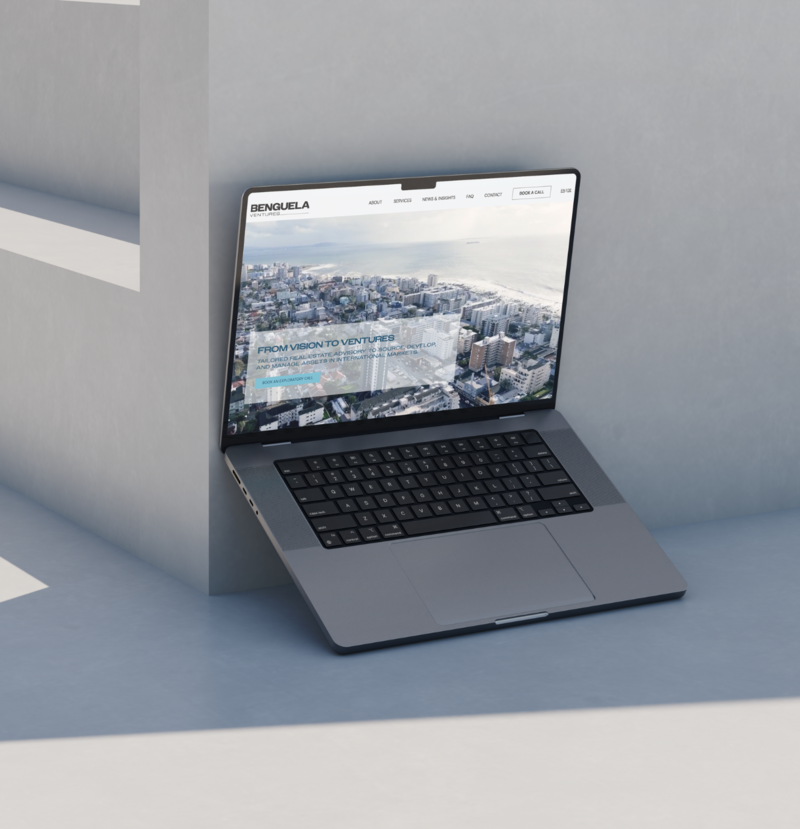 Macbook showing a Real Estate Firm Website