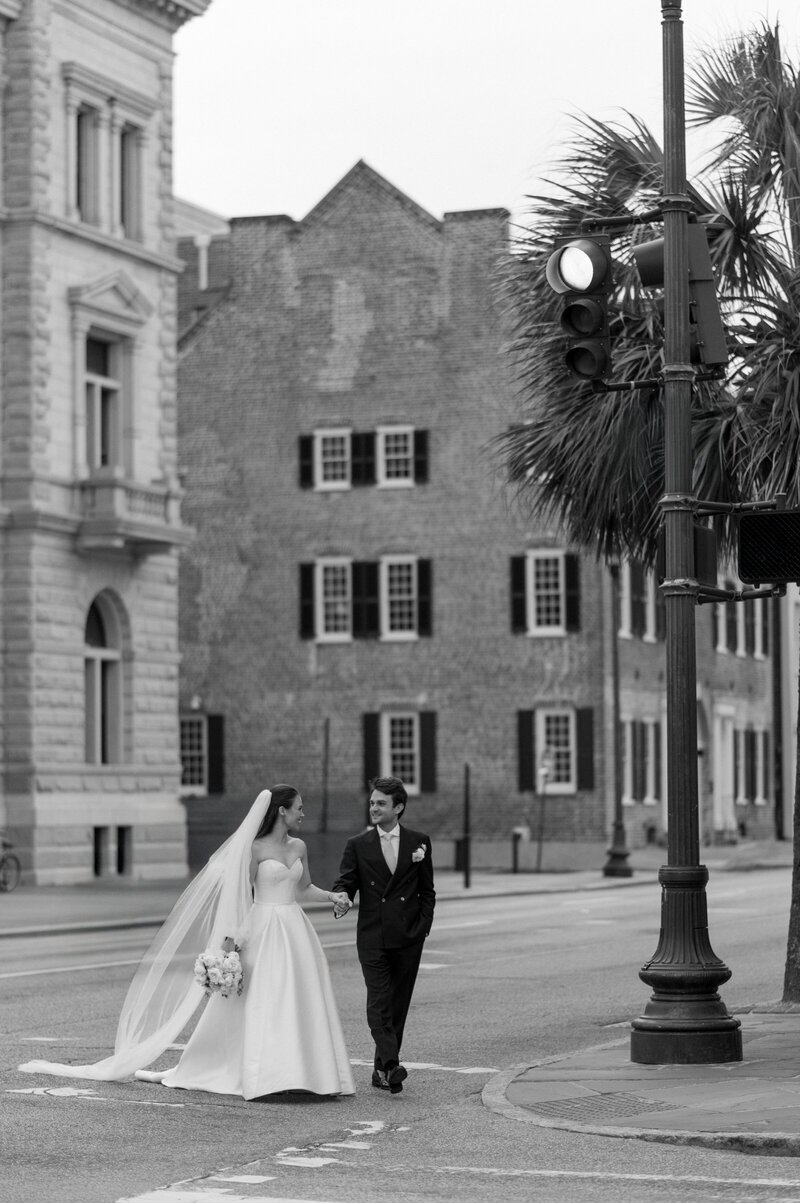 Bride and groom walk up memorial steps at their DC wedding