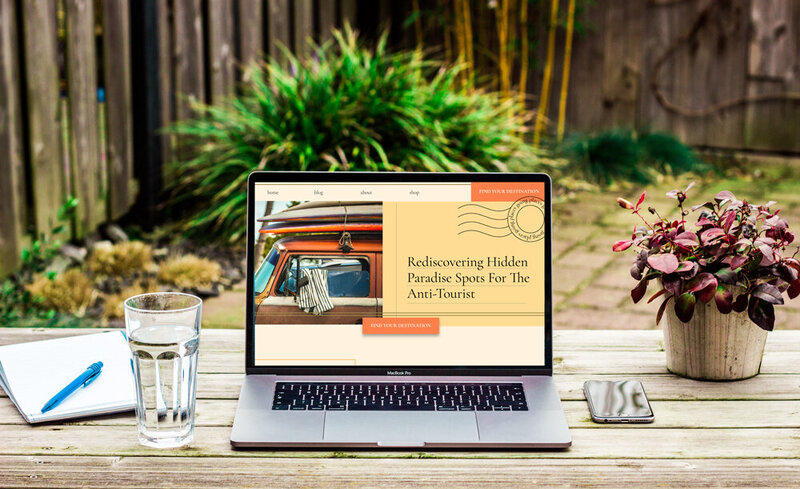 computer with travel blog website on it