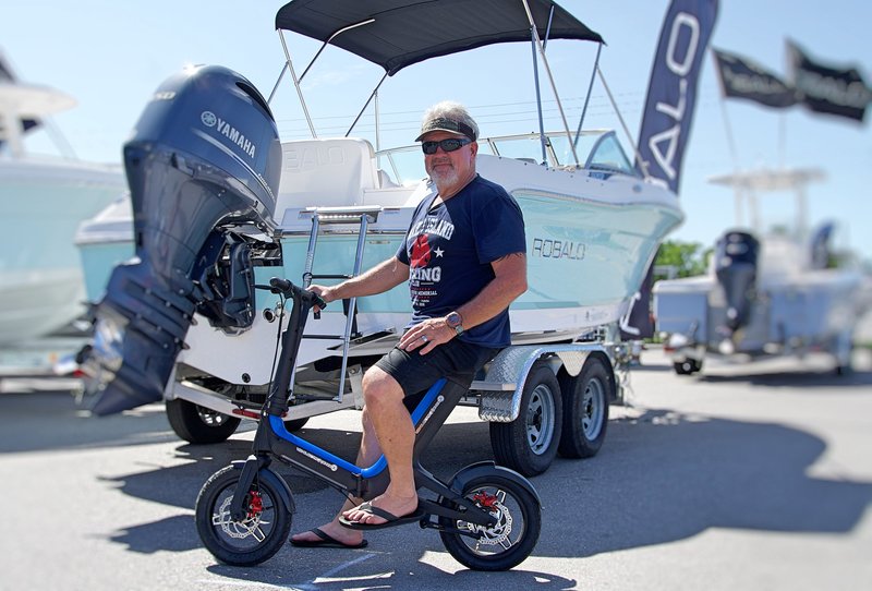Boater sitting on his Blue Go-Bike M3