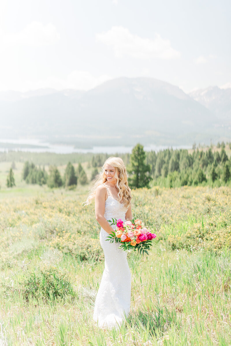 Lake Dillion Reservoir Colorado Elopement Wedding Mountain View Summer Pink and Orange Florals Sparkly Dress Light and Airy Elena Spraguer Photography0073
