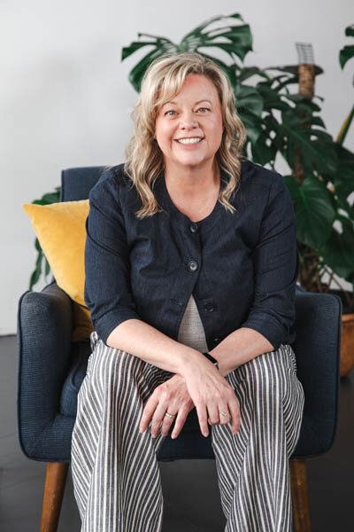 Lori Lubbers Mental Health Therapist in Skagit Valley, Washington sitting in a chair