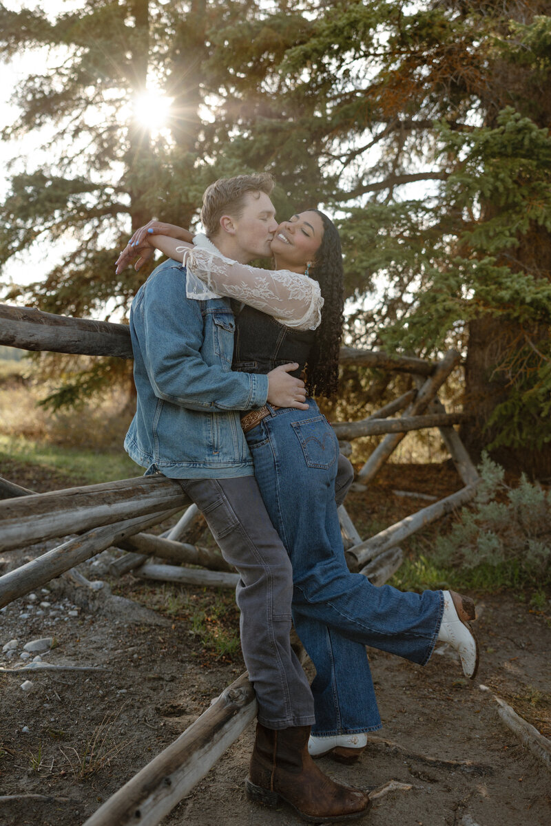 Couple taking couples photos at Schwabacher Landing in Jackson Hole, Wyoming