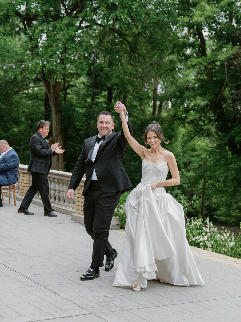 bride and groom celebrating during wedding