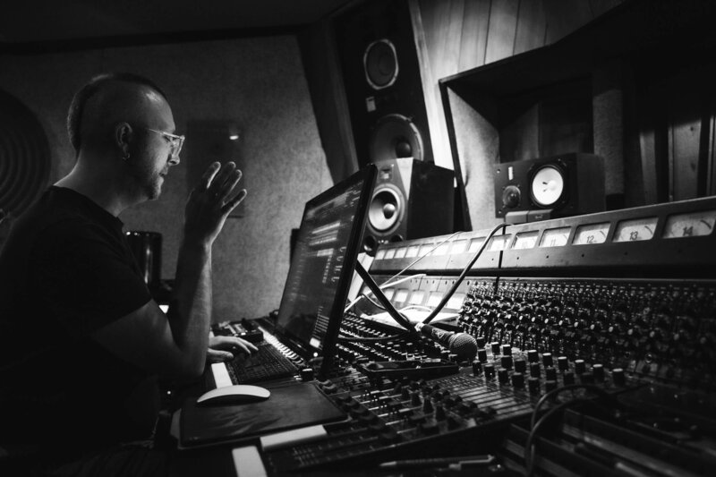 Producer songwriter Ben Pelchat working in music studio