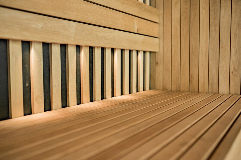Clean wooden sauna benches at Vitalis Mount Juliet studio with natural cedar construction