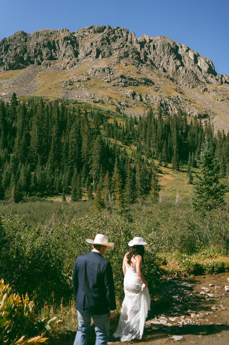 colorado elopement in the san juan mountains, couple hiking