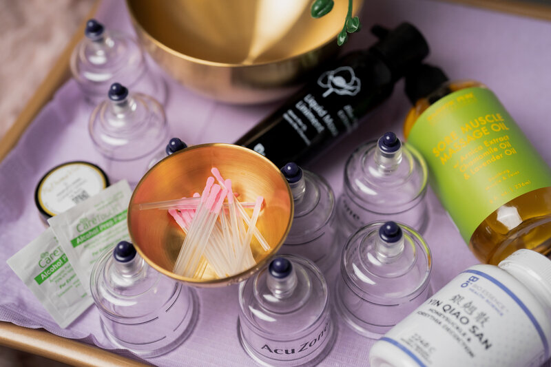 Detail photo from a branding session with Luxe Body Wellness in Trinity, Florida — featuring acupuncture needles and AcuZone cupping tools. Captured by Lux Content Co. to showcase this whole-body wellness center offering IV therapy, facials, and integrative Eastern and Western medicine.