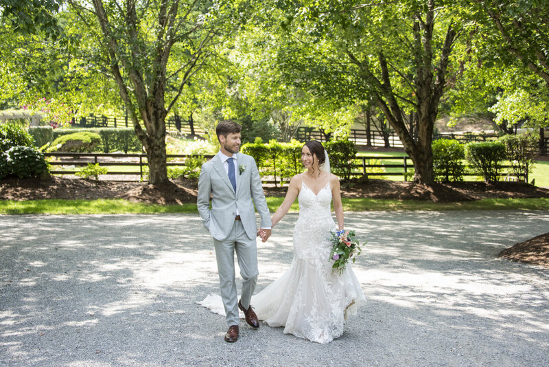 Couple walking at Hawkesdene wedding