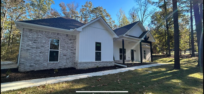 Custom Home White Siding and Brick