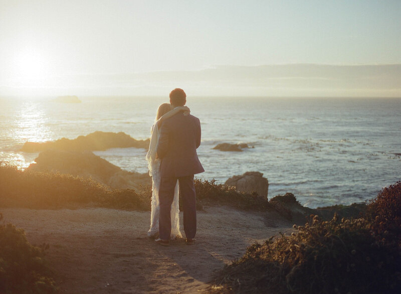 Intimate elopement at San Francisco City Hall, captured in a documentary-style photograph with a mix of digital and film, showcasing candid moments and the architectural beauty of the iconic venue.