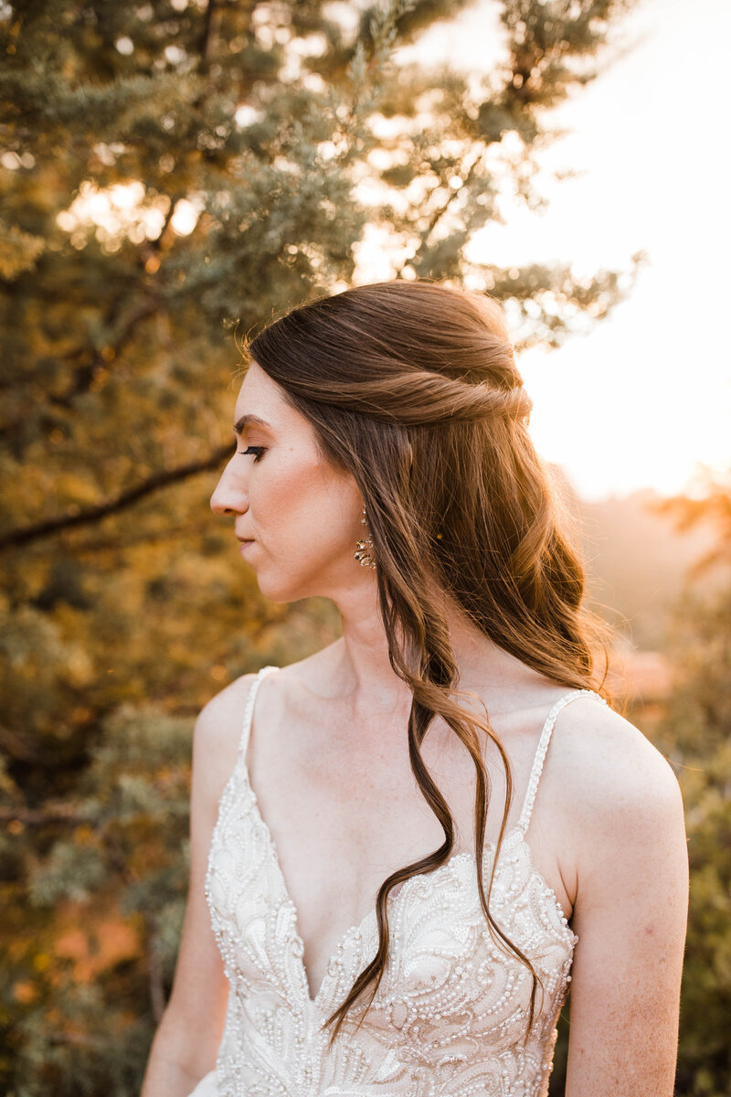 the groom lifts the bride off her feet during their elopement first look