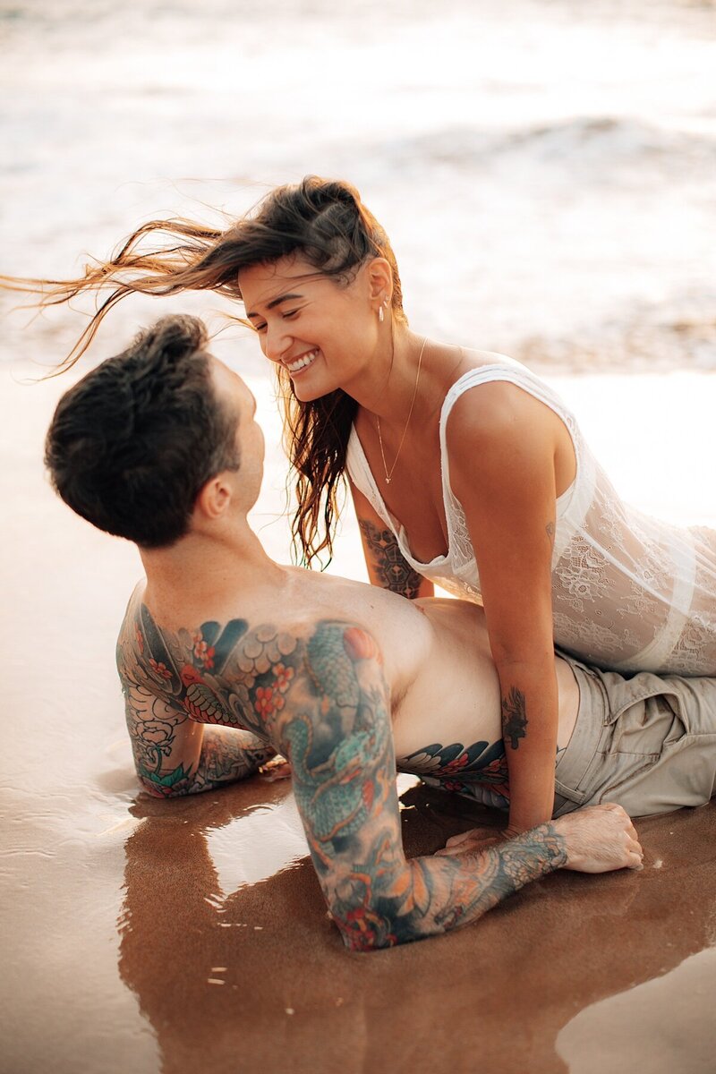sunset engagement photograph in the ocean by love and water on maui