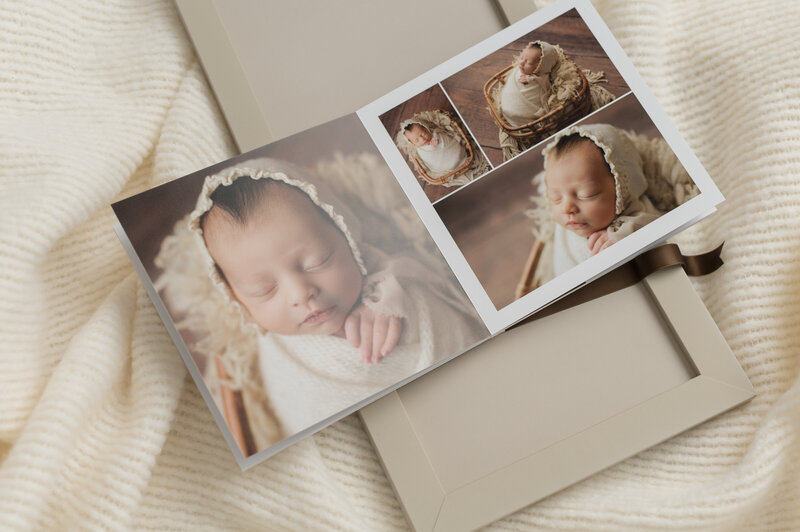 photo album with anewborn baby