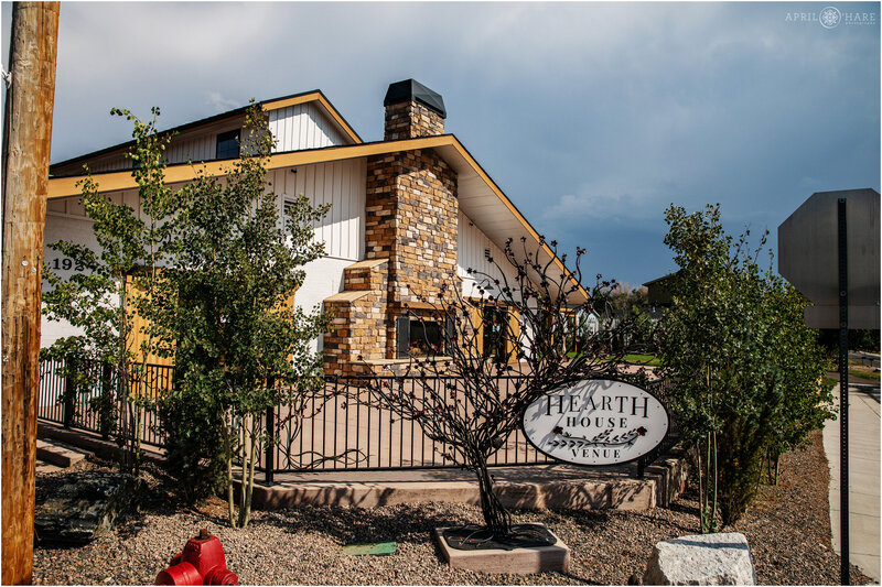 1 Hearth-House-Exterior-Photo-During-Summer-with-Dramatic-Stormy-Sky-in-Colorado