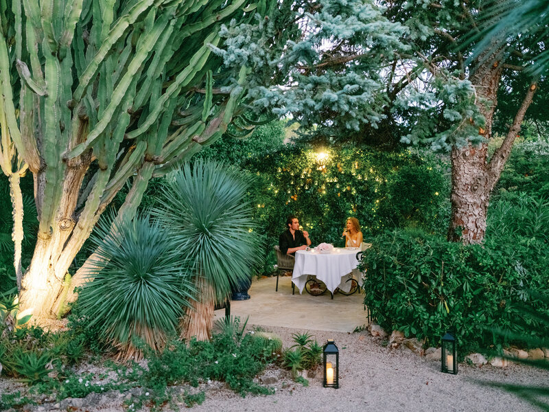 Private Secret Garden dinner (Michelin chef) table with the couple at the Four Seasons Grand Hotel du Cap-Ferrat
