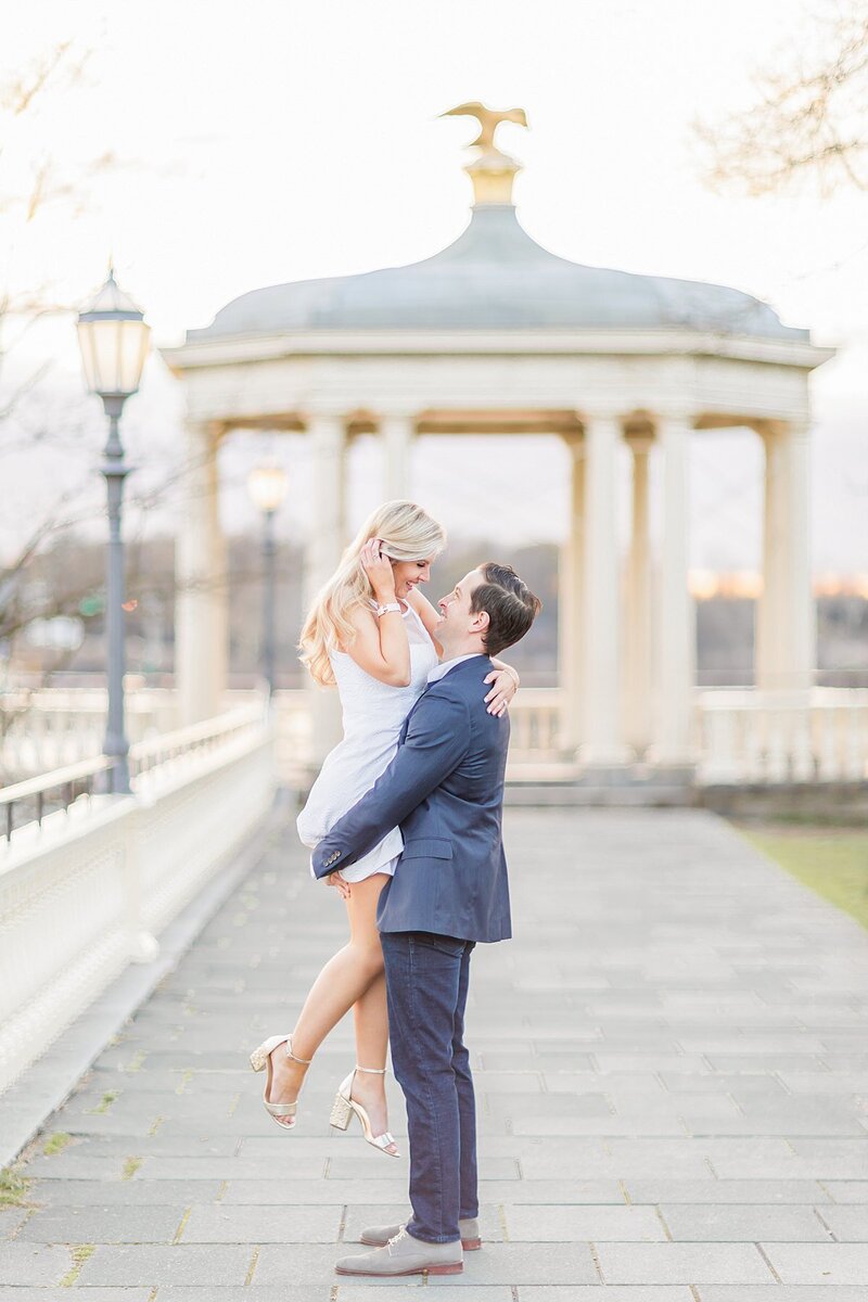 Bride and groom walk up memorial steps at their DC wedding