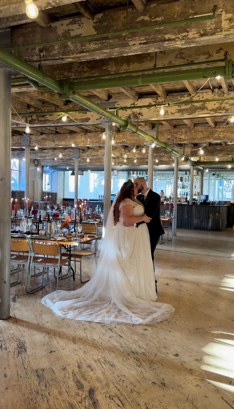 Bride and Groom naturally embracing with each other