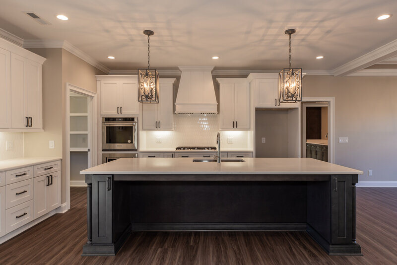 James Alexander Homes, custom home builder, North Carolina, family-owned builders, bespoke homes, semi-custom homes, speculative homes, luxury home builders, custom home designs, handcrafted homes, intentional design, timeless craftsmanship, personalized home building, home design services, pre-designed homes, dream homes, tailored living spaces, unique floor plans, quality construction, affordable custom homes, curated finishes, residential construction North Carolina, energy-efficient homes, family-friendly designs, signature house plans, cost-effective home building, custom floor plans, craftsmanship, home building experience, home financing options, bespoke design process, dream home financing, detailed design discussions, semi-custom home builds, signature designs, unique living spaces, intentional home design, timeless home architecture, home building consultation, exceptional craftsmanship, tailored aesthetics, dream home creation, custom finishes, built-for-family homes