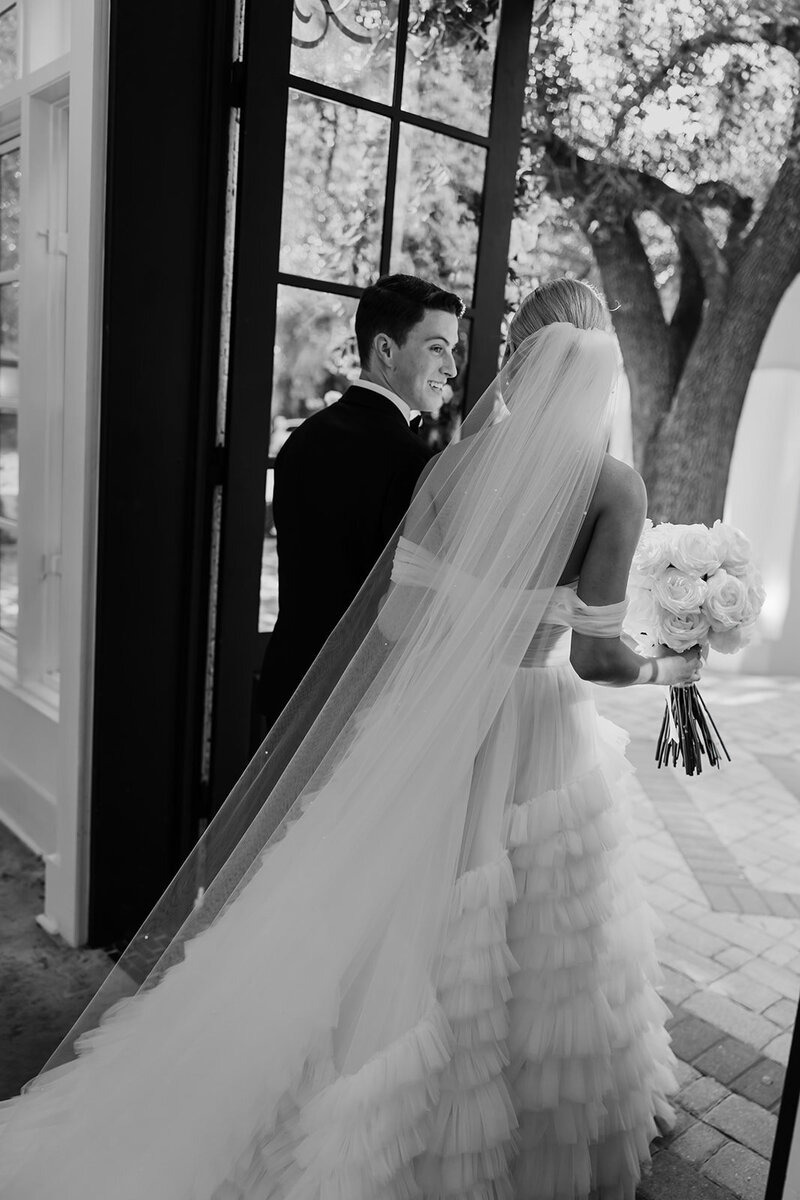 Bridal shoes with champagne bottle.