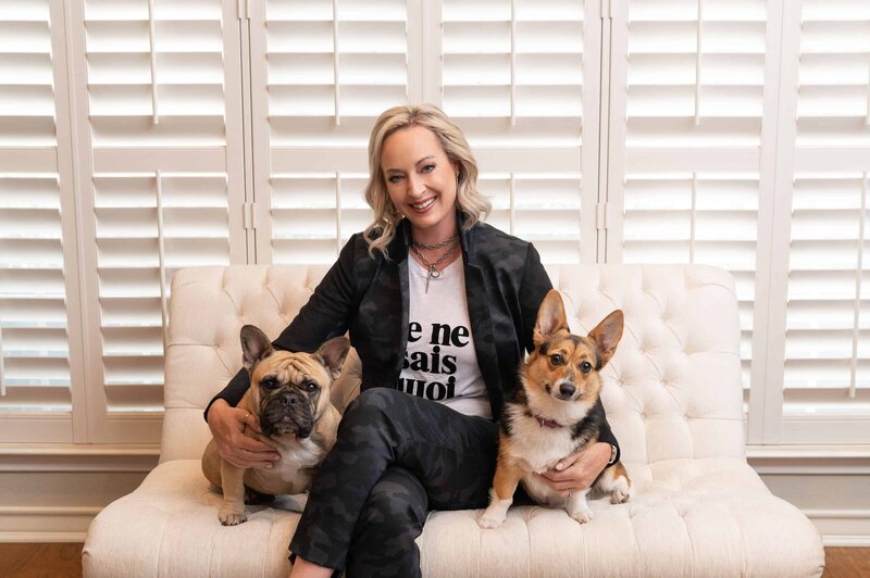 Photographer Shannon in the studio with 2 dogs