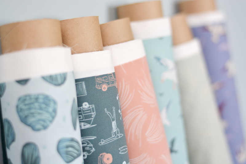 A row of fabric bolts from the Short Sands collection designed by Skye McNeill