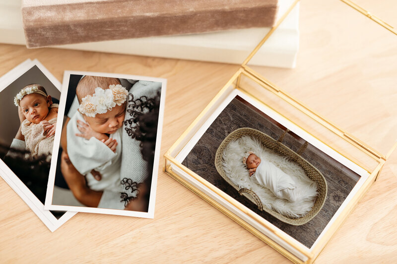 flat lay mock ups of gold  picture box and album of babies