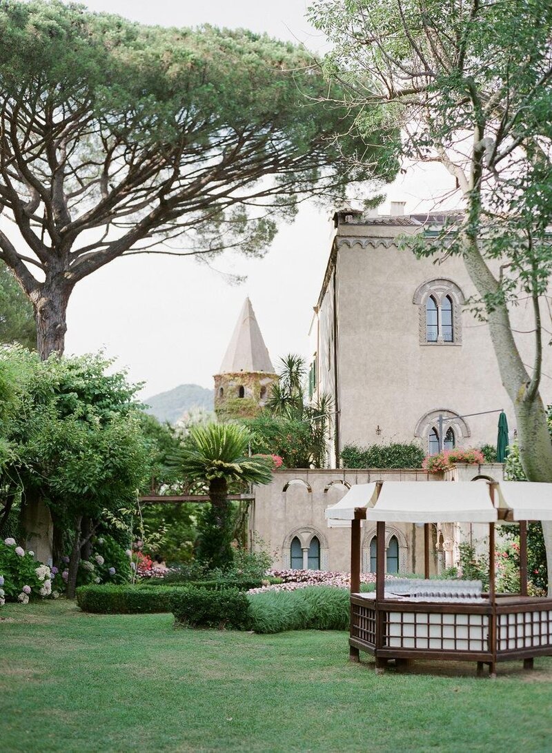 The cream and brown living room of a guest suite at Borgo Santo Pietro