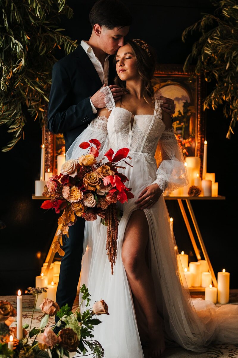 bride and groom sharing an intimate moment during their wedding portrait