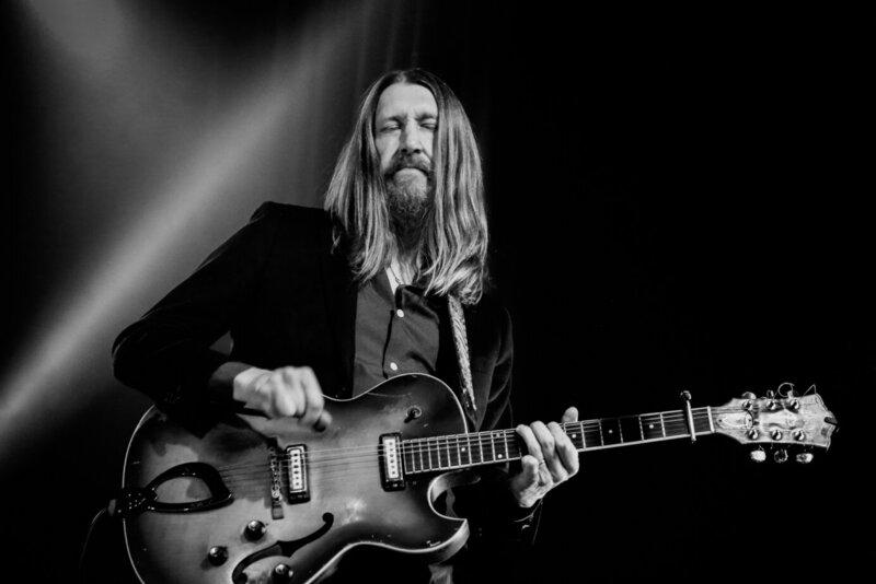 The Wood Brothers are photographed by Light Shifter Studios at the Orange Peel music venue. 
