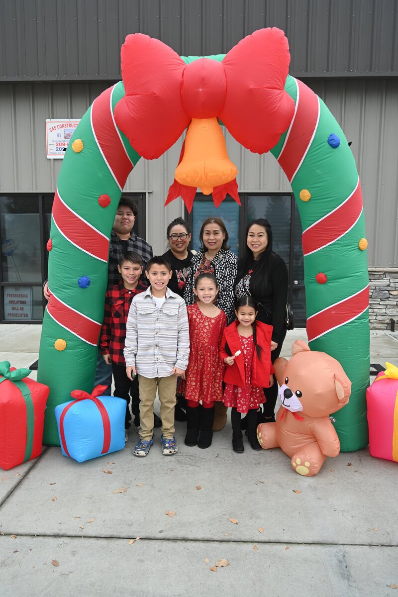 Family gifted by Santa For Scholars