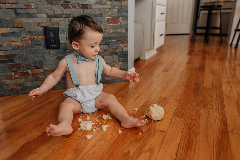 Baby sitting on the floor.